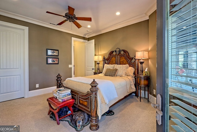 bedroom with ceiling fan, ornamental molding, and light carpet