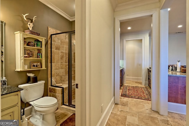 bathroom with an enclosed shower, vanity, crown molding, and toilet