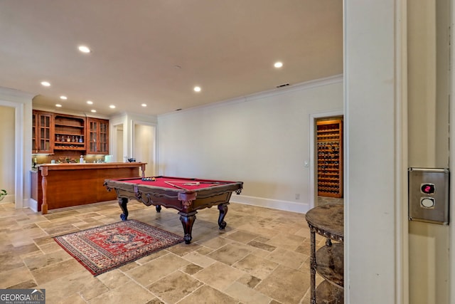 recreation room featuring crown molding, bar area, and billiards