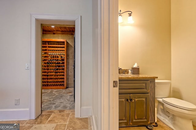 wine room with sink and wooden ceiling