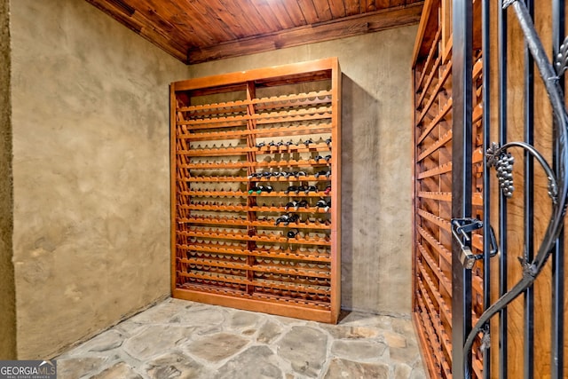 wine area featuring wooden ceiling