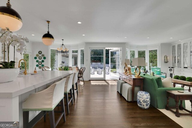 living room featuring dark hardwood / wood-style floors and french doors