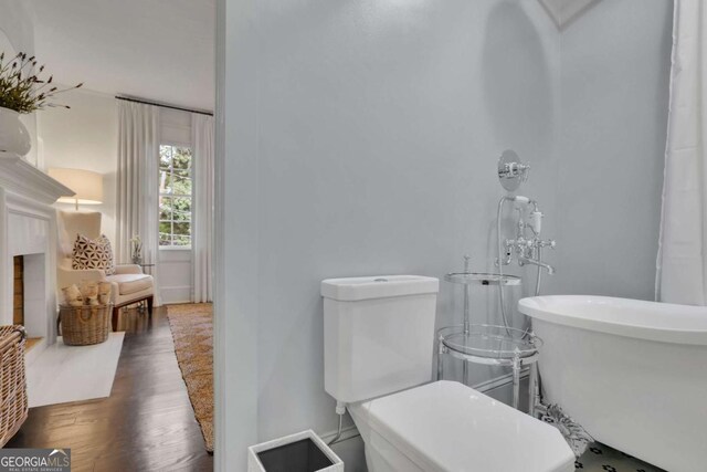 bathroom with vanity and hardwood / wood-style floors