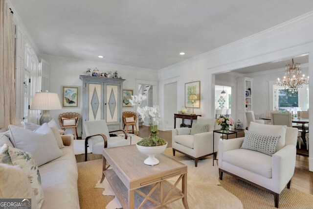 dining area featuring ornamental molding, dark hardwood / wood-style flooring, and a chandelier