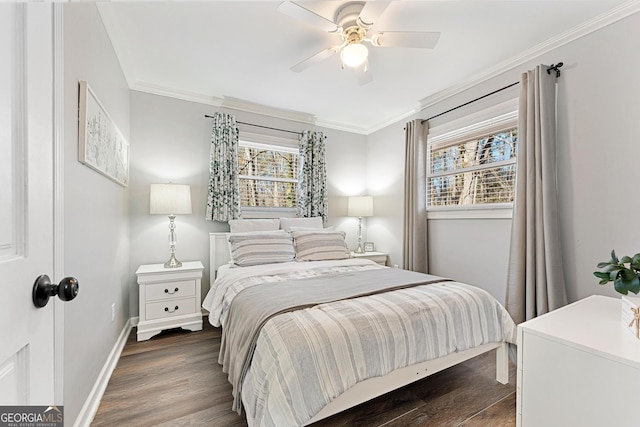 bedroom featuring multiple windows, crown molding, dark wood-type flooring, and ceiling fan