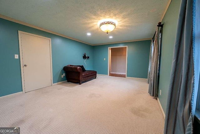 unfurnished room featuring crown molding, light carpet, and a textured ceiling