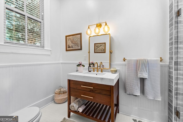 bathroom with vanity and toilet