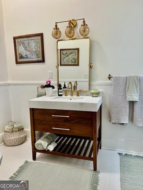 bathroom featuring vanity and wood-type flooring