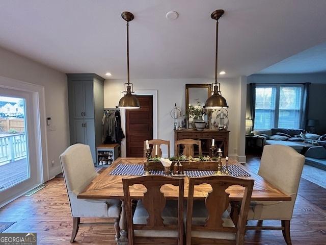 dining room with light hardwood / wood-style floors