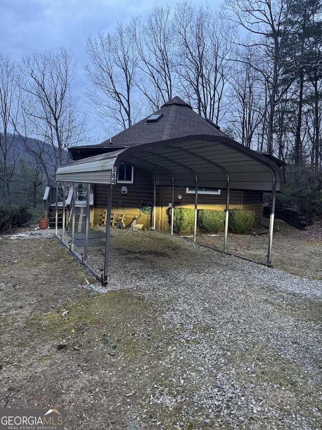 view of car parking with a carport