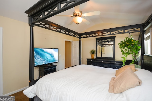 bedroom with vaulted ceiling, carpet floors, and ceiling fan