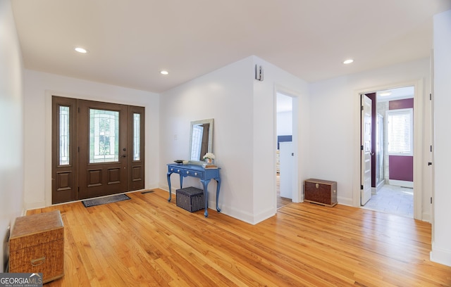 foyer with light hardwood / wood-style flooring