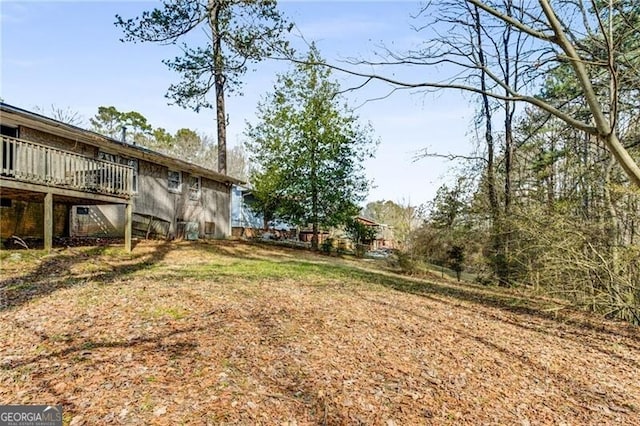 view of yard with a deck