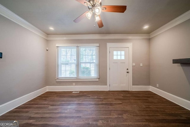 3693 Aldea Dr, Decatur, GA 30032 - foyer entrance with dark wood-type flooring, ceiling fan, and ornamental molding