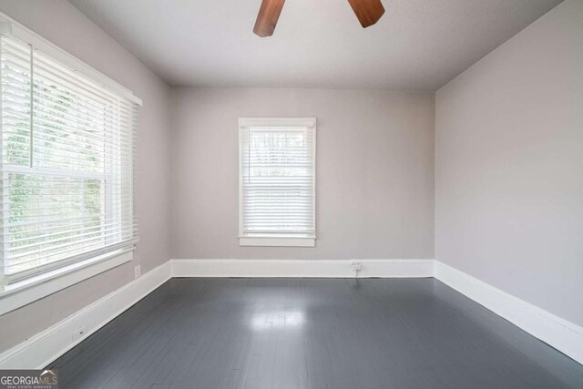 3693 Aldea Dr, Decatur, GA 30032 - empty room with dark hardwood / wood-style floors and ceiling fan