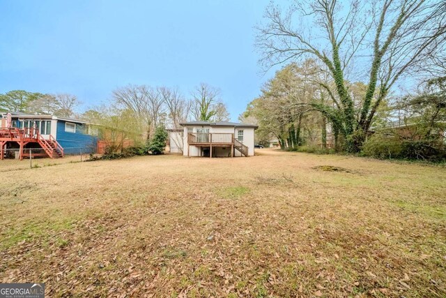 3693 Aldea Dr, Decatur, GA 30032 - view of yard featuring a deck