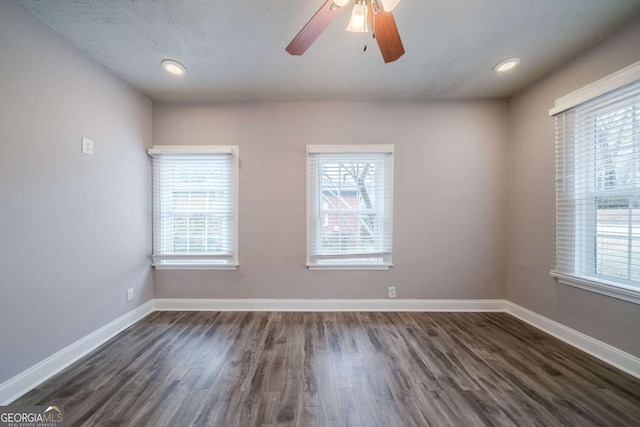 3693 Aldea Dr, Decatur, GA 30032 - empty room featuring a textured ceiling, dark hardwood / wood-style floors, and ceiling fan