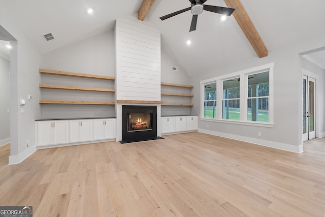 unfurnished living room featuring light hardwood / wood-style flooring, ceiling fan, beam ceiling, high vaulted ceiling, and a fireplace