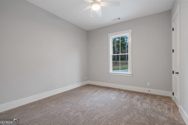 unfurnished room with carpet floors and ceiling fan