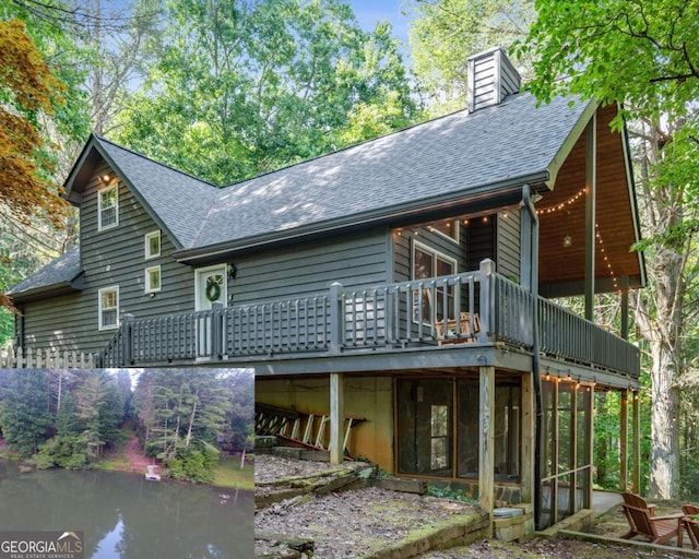 rear view of property with a sunroom