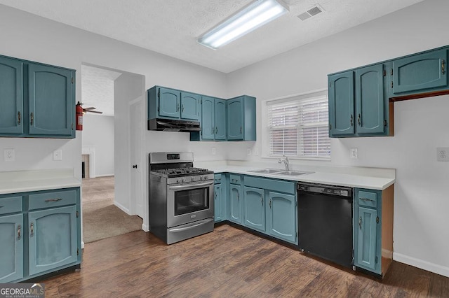 kitchen with stainless steel gas stove, sink, blue cabinetry, and black dishwasher