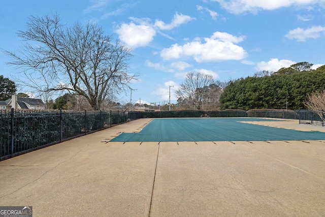 view of pool featuring a patio