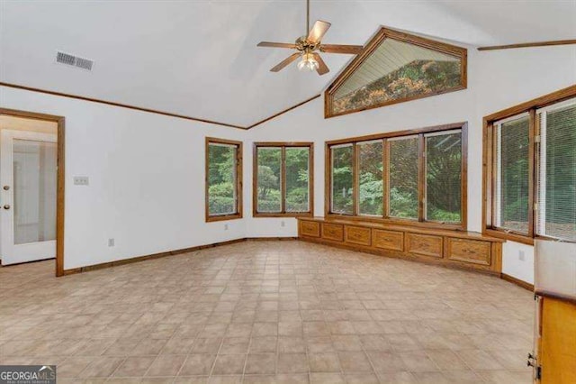 unfurnished sunroom with vaulted ceiling and ceiling fan