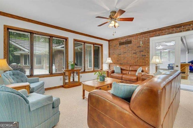 living room featuring light colored carpet, ceiling fan, and brick wall