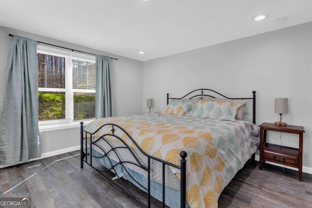 bedroom featuring dark hardwood / wood-style floors