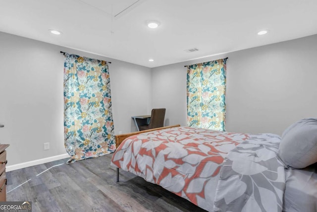 bedroom featuring wood-type flooring