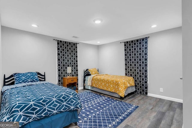 bedroom featuring hardwood / wood-style floors