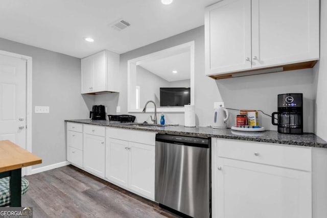 kitchen featuring dishwasher, wood-type flooring, sink, and white cabinets