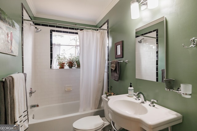 full bathroom with crown molding, sink, toilet, and shower / bath combination with curtain