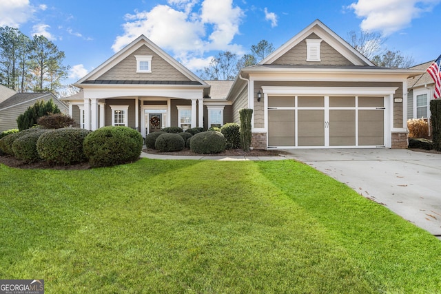 craftsman-style house with a garage, a porch, and a front lawn