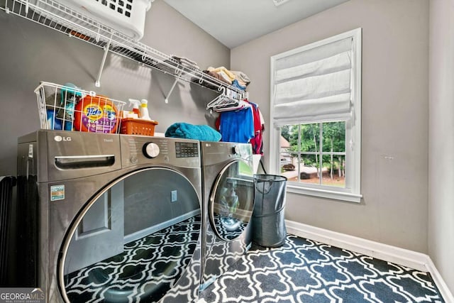 laundry area with washer and clothes dryer