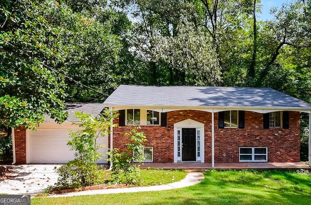 1139 Pine Mountain Dr, Forest Park, GA 30297 - bi-level home featuring a garage and a front lawn