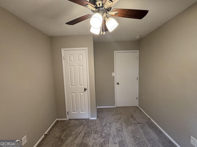 unfurnished bedroom with light carpet and ceiling fan