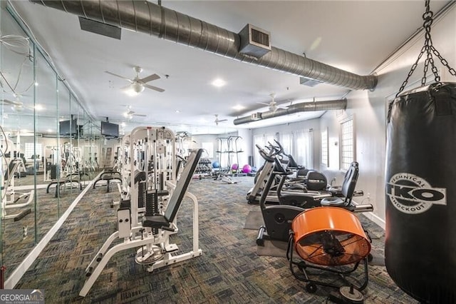 exercise room featuring ceiling fan and carpet flooring