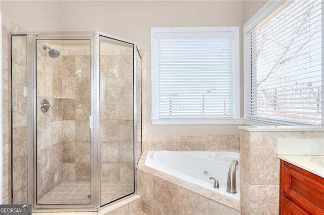 bathroom featuring vanity and plus walk in shower