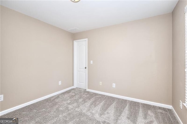 empty room featuring carpet