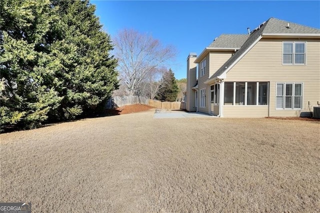 exterior space with cooling unit and a patio area