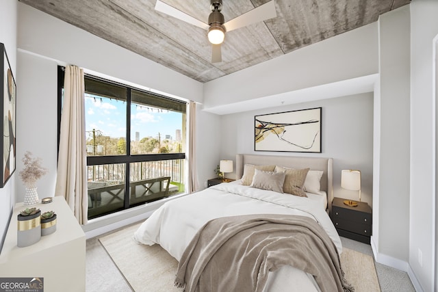 bedroom featuring ceiling fan, access to outside, and carpet flooring