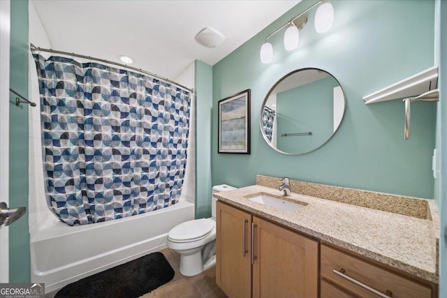 bathroom with shower / bath combo, vanity, toilet, and tile patterned floors