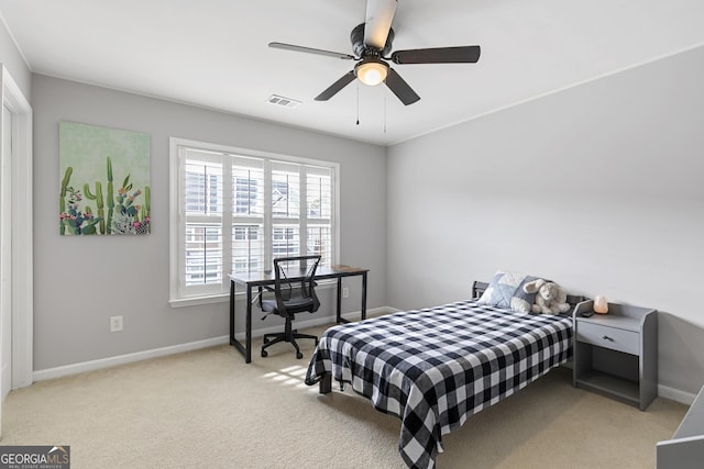 carpeted bedroom featuring ceiling fan