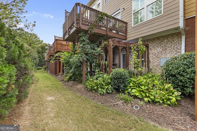 view of property exterior featuring a yard and a pergola