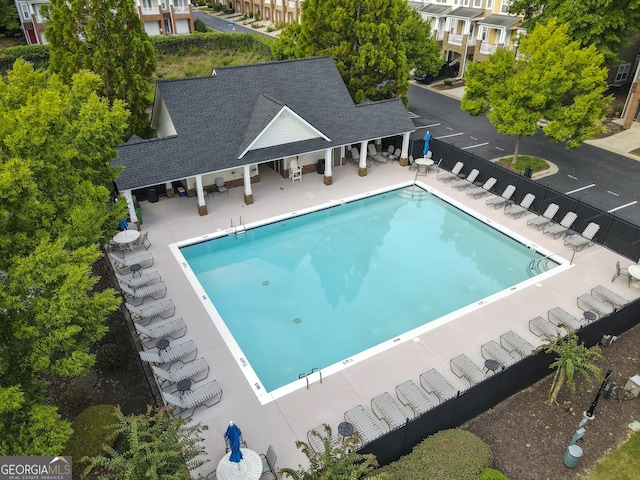 view of swimming pool with a patio