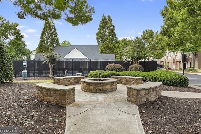 view of patio / terrace with a fire pit