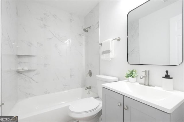 full bathroom with vanity, toilet, and tiled shower / bath combo