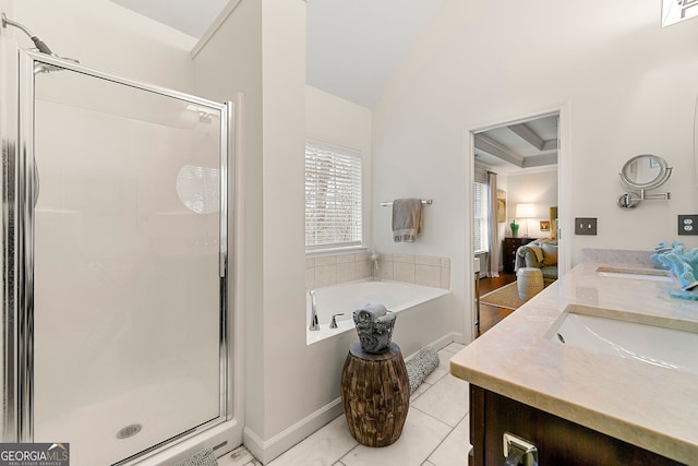 bathroom featuring vanity, tile patterned floors, and plus walk in shower