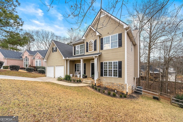 view of front of house with covered porch and a front lawn